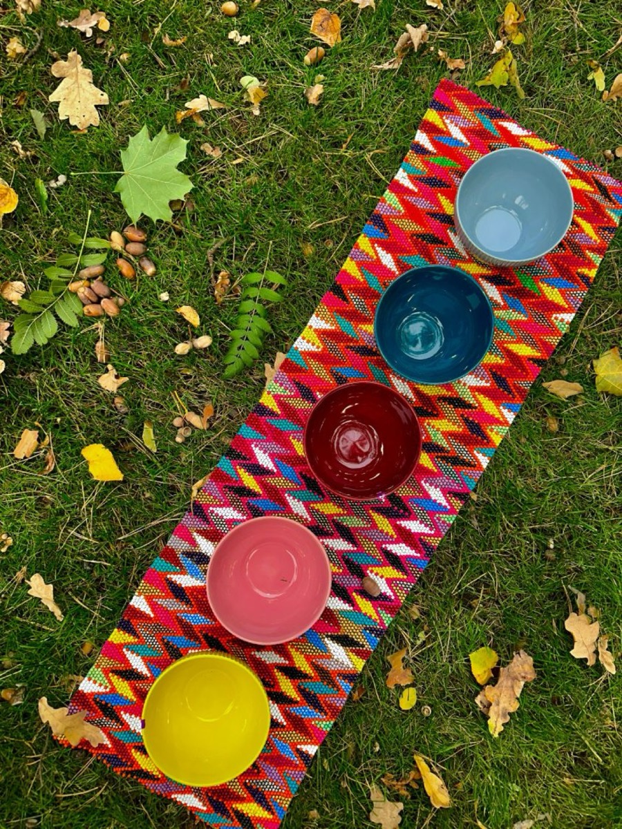Maroon Winds with five coloured bowls
