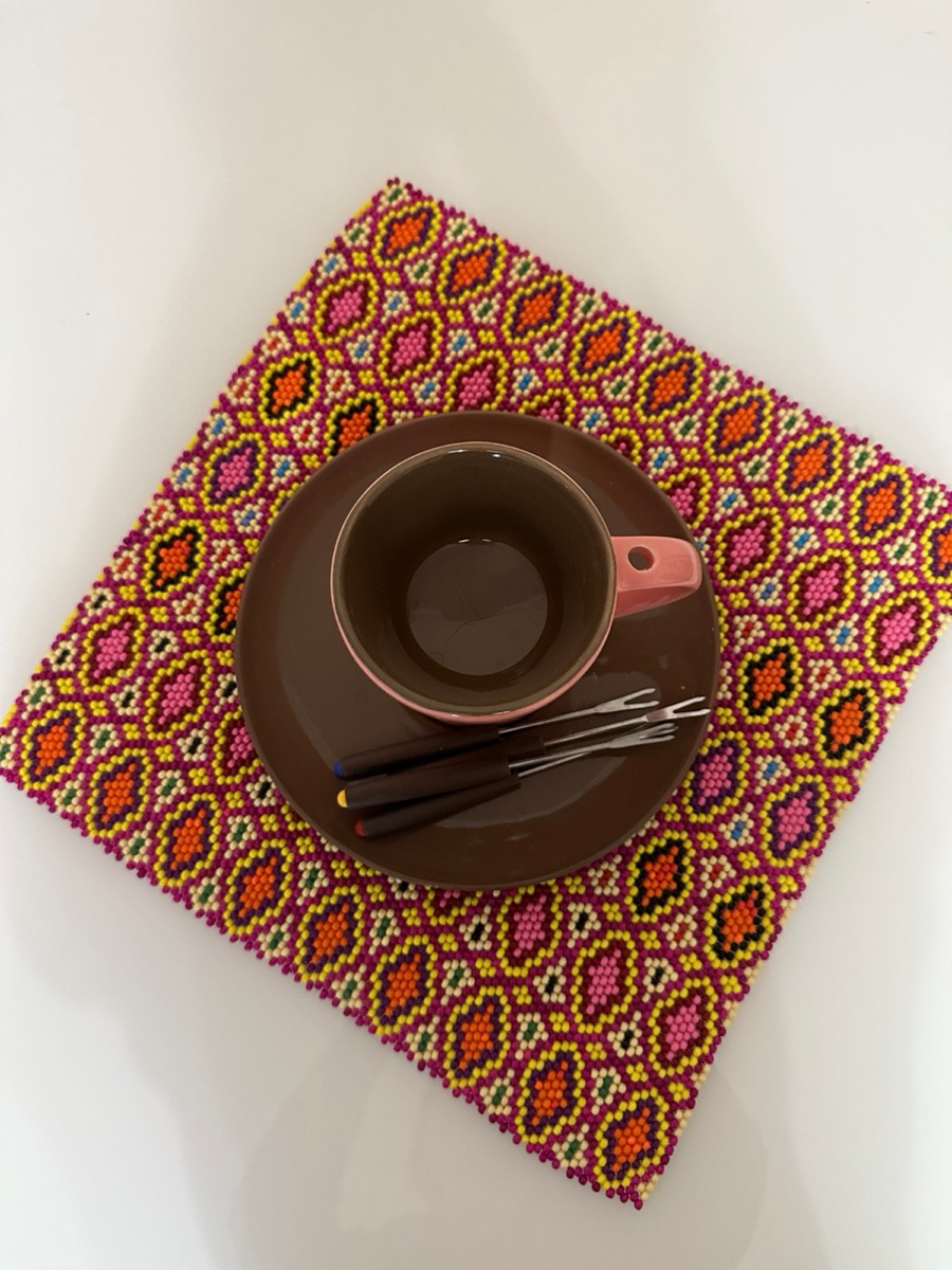 Pink diamonds with a cup and saucer on top