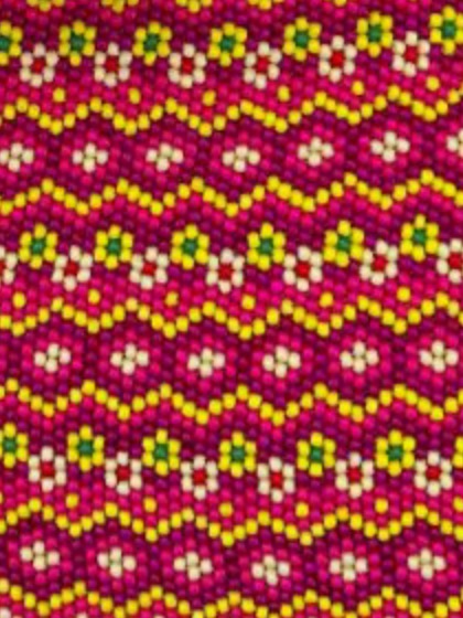 Close-up of Pink waves: yellow zigzag rows on pink