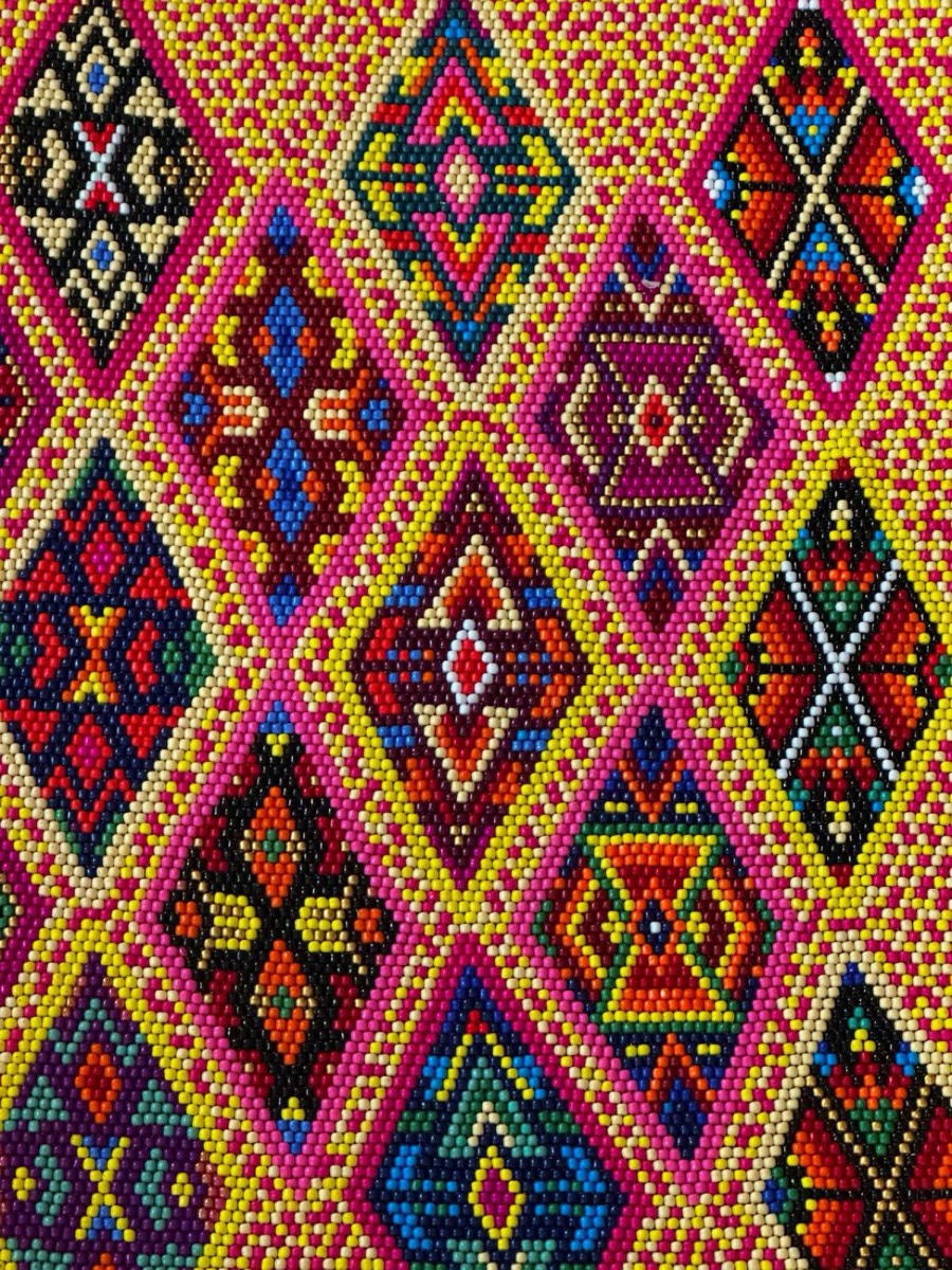 Close-up of the yellow diamond runner: rows of beaded diamonds in pink, red, blue and gold